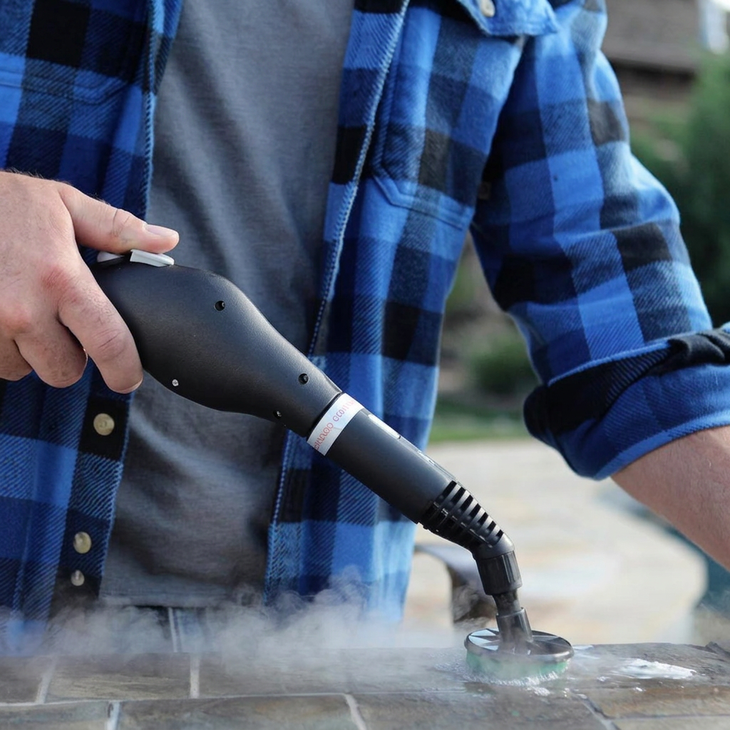 Handheld steam cleaner releasing hot steam during upholstery cleaning